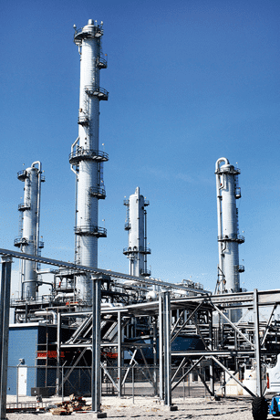 Low view of the Mont Belvieu fractionation facility against a clear sky